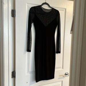 Stunning cocktail dress with sheer sleeves